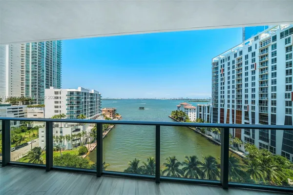 a view of a balcony with an ocean view