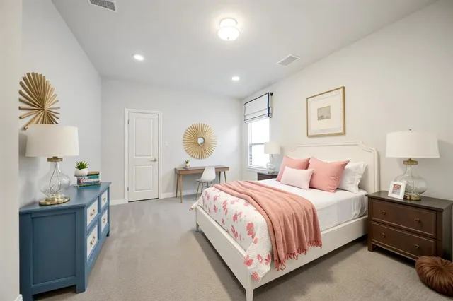 a view of an empty room and a window