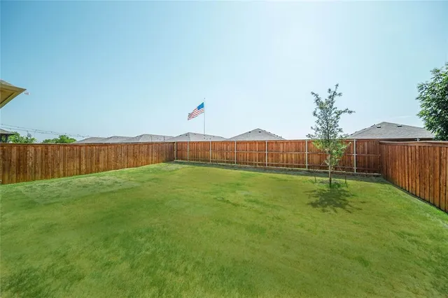 a view of an outdoor space and a yard