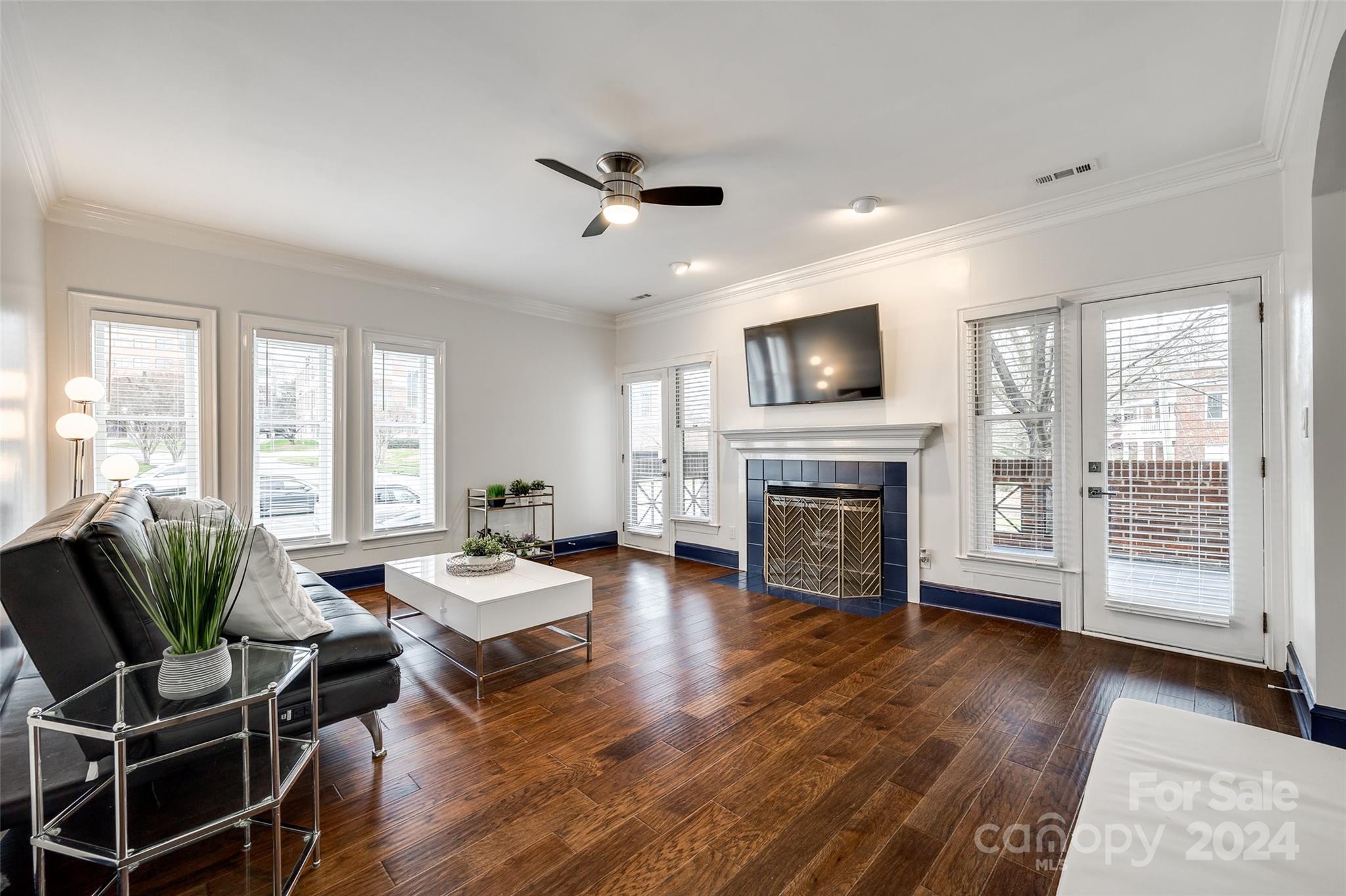 325 Queens Road Charlotte, NC 28204 - Photo 15 of 33 a living room with furniture fireplace and flat screen tv