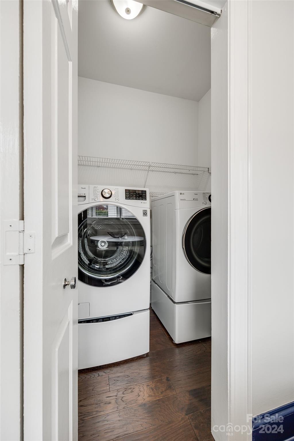 325 Queens Road Charlotte, NC 28204 - Photo 22 of 33 a utility room with dryer and washer