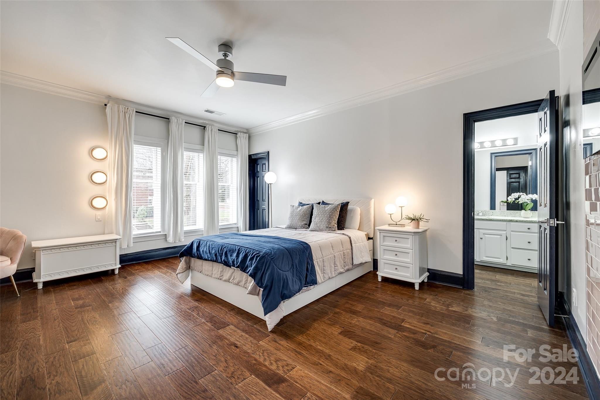 325 Queens Road Charlotte, NC 28204 - Photo 23 of 33 a spacious bedroom with a bed and a view of bedroom
