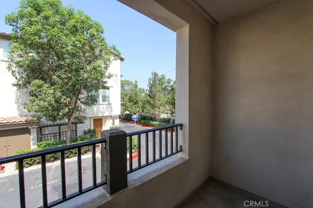 a view of a balcony with an outdoor space