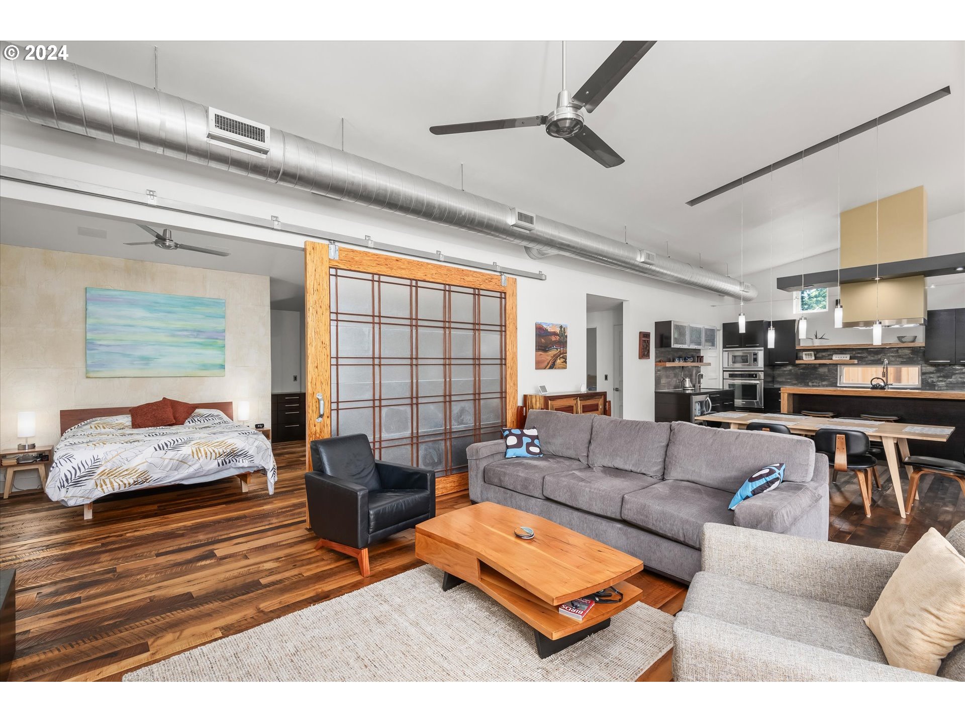 1261 Crenshaw Road Eugene, OR 97401 - Photo 12 of 48 a living room with furniture and a large window