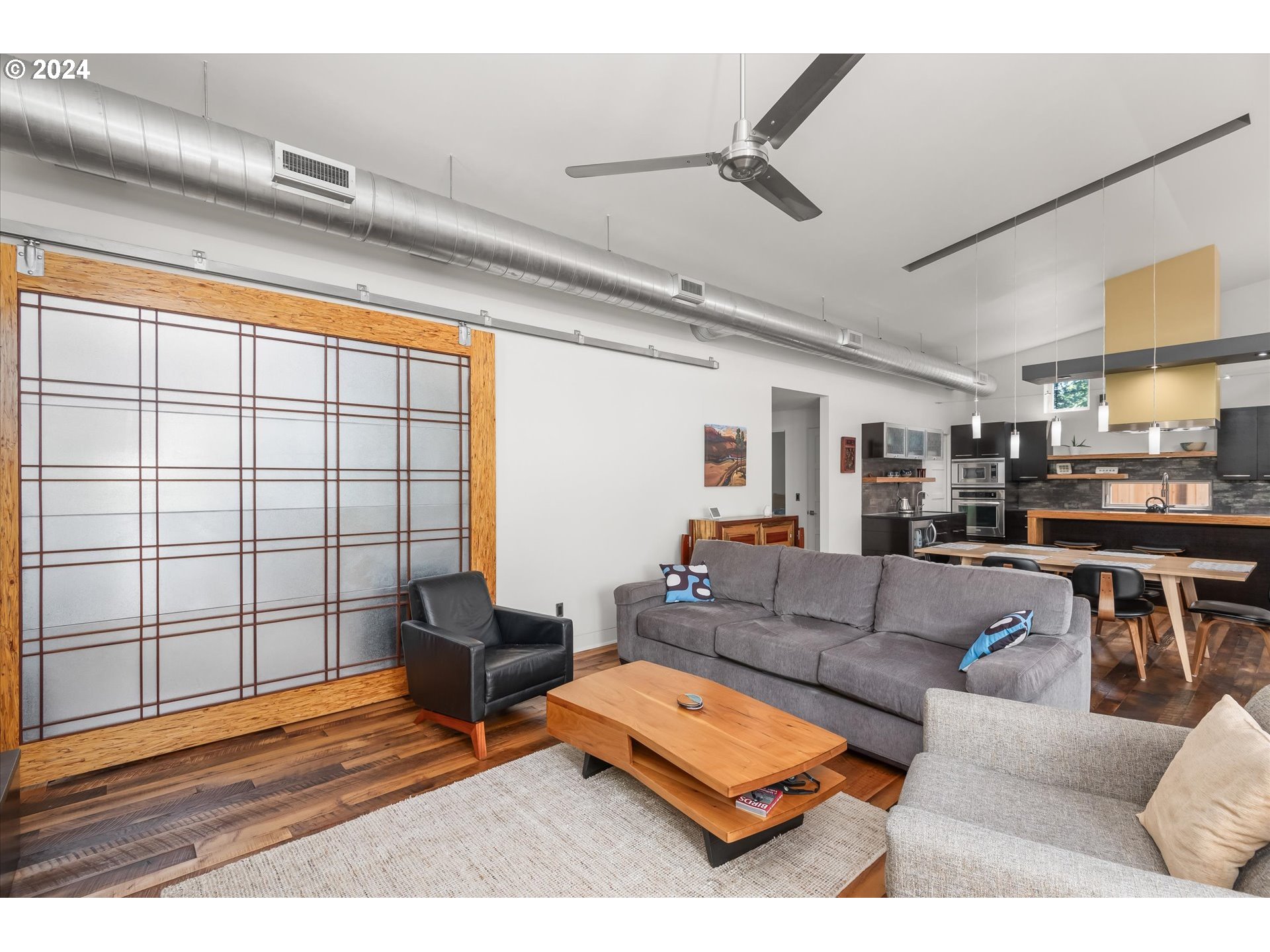 1261 Crenshaw Road Eugene, OR 97401 - Photo 13 of 48 a living room with furniture and a large window