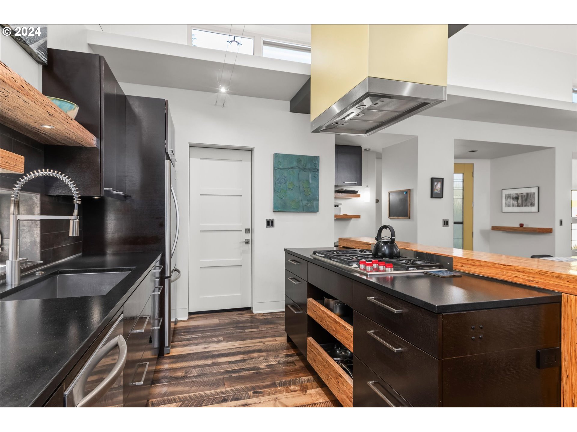 1261 Crenshaw Road Eugene, OR 97401 - Photo 22 of 48 a kitchen view with granite countertop a sink and cabinets