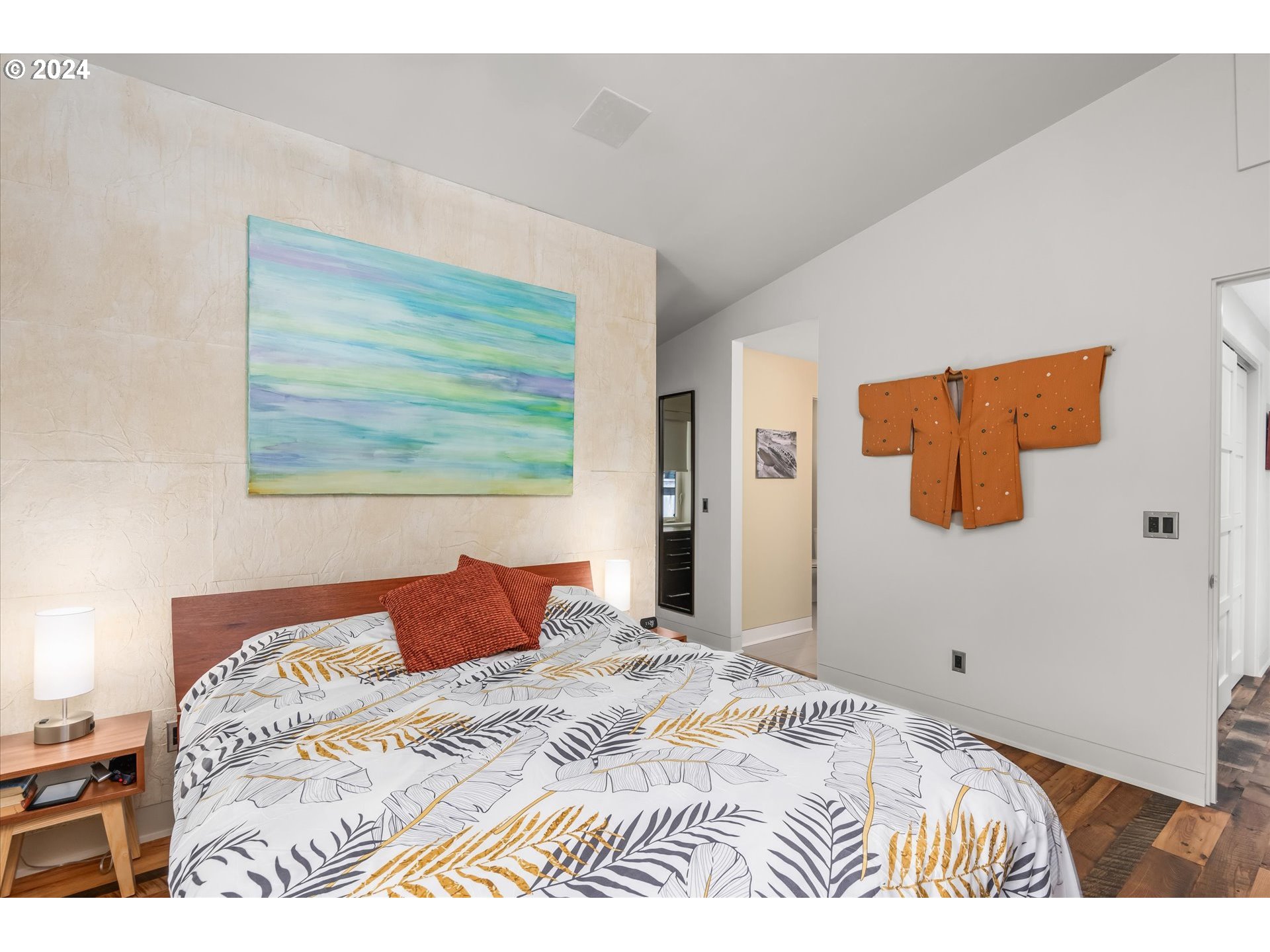 1261 Crenshaw Road Eugene, OR 97401 - Photo 27 of 48 a bedroom with a large bed and a lamp