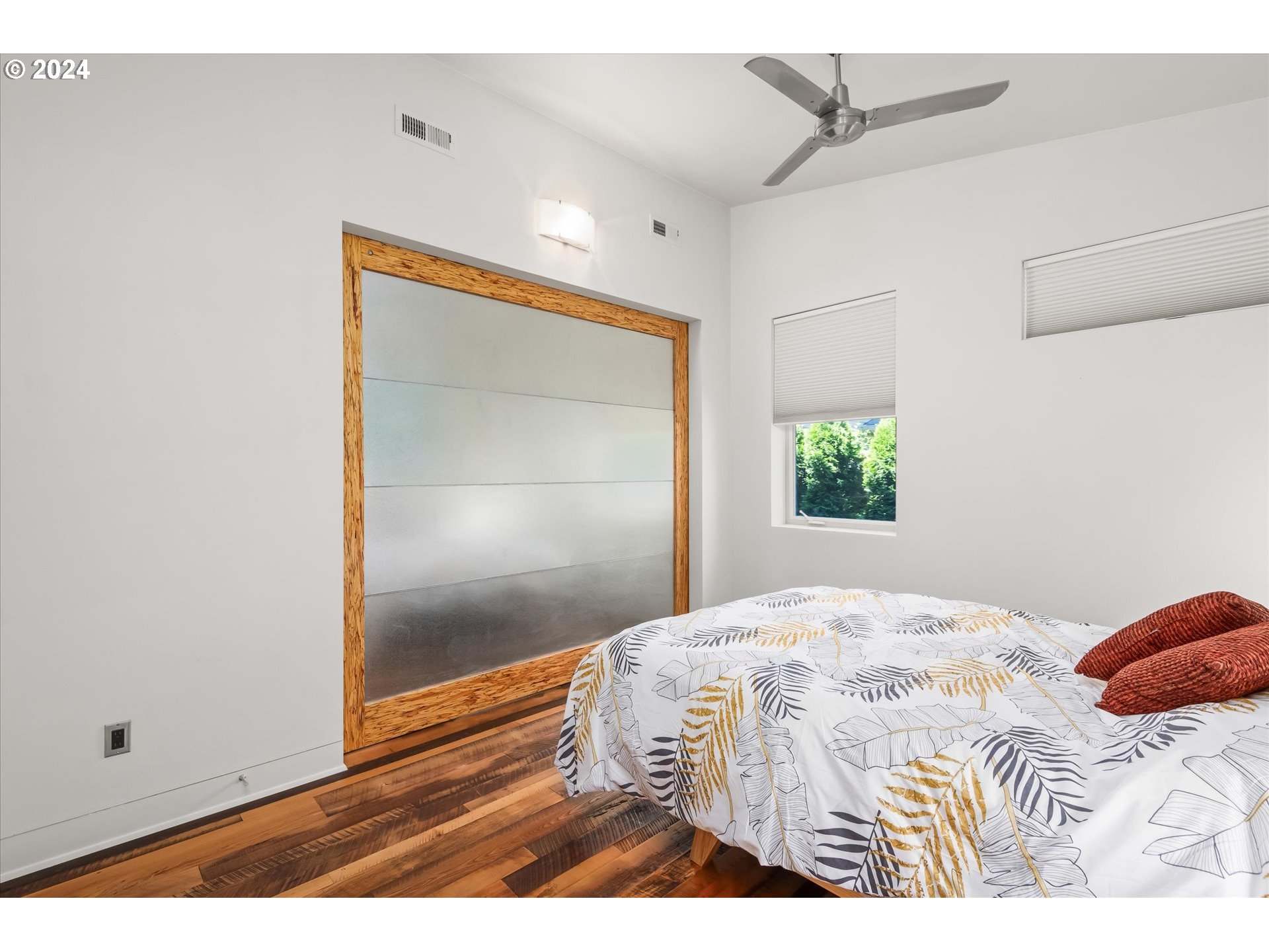 1261 Crenshaw Road Eugene, OR 97401 - Photo 28 of 48 a bedroom with a bed and a window