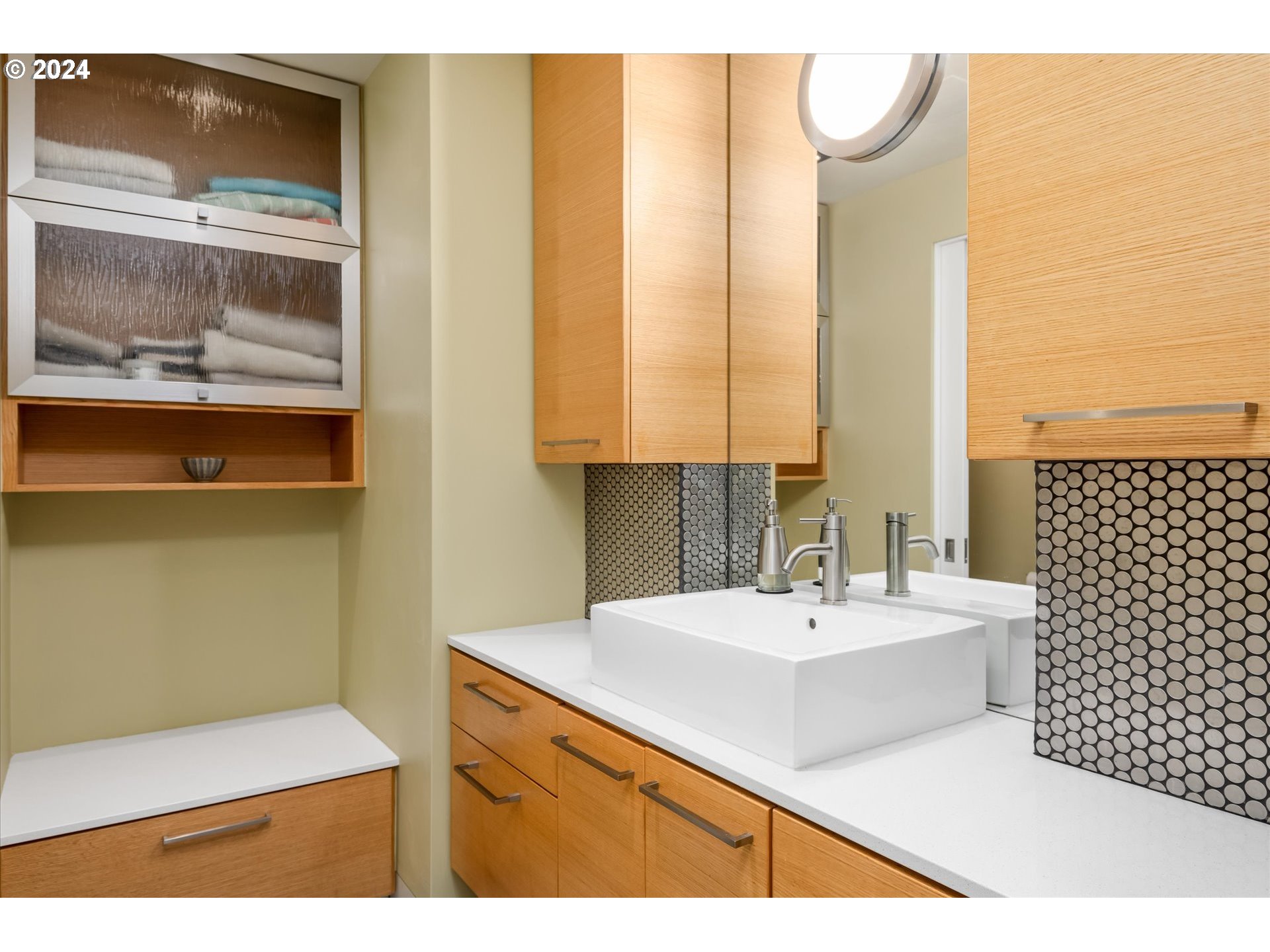 1261 Crenshaw Road Eugene, OR 97401 - Photo 32 of 48 a bathroom with a sink vanity and a mirror