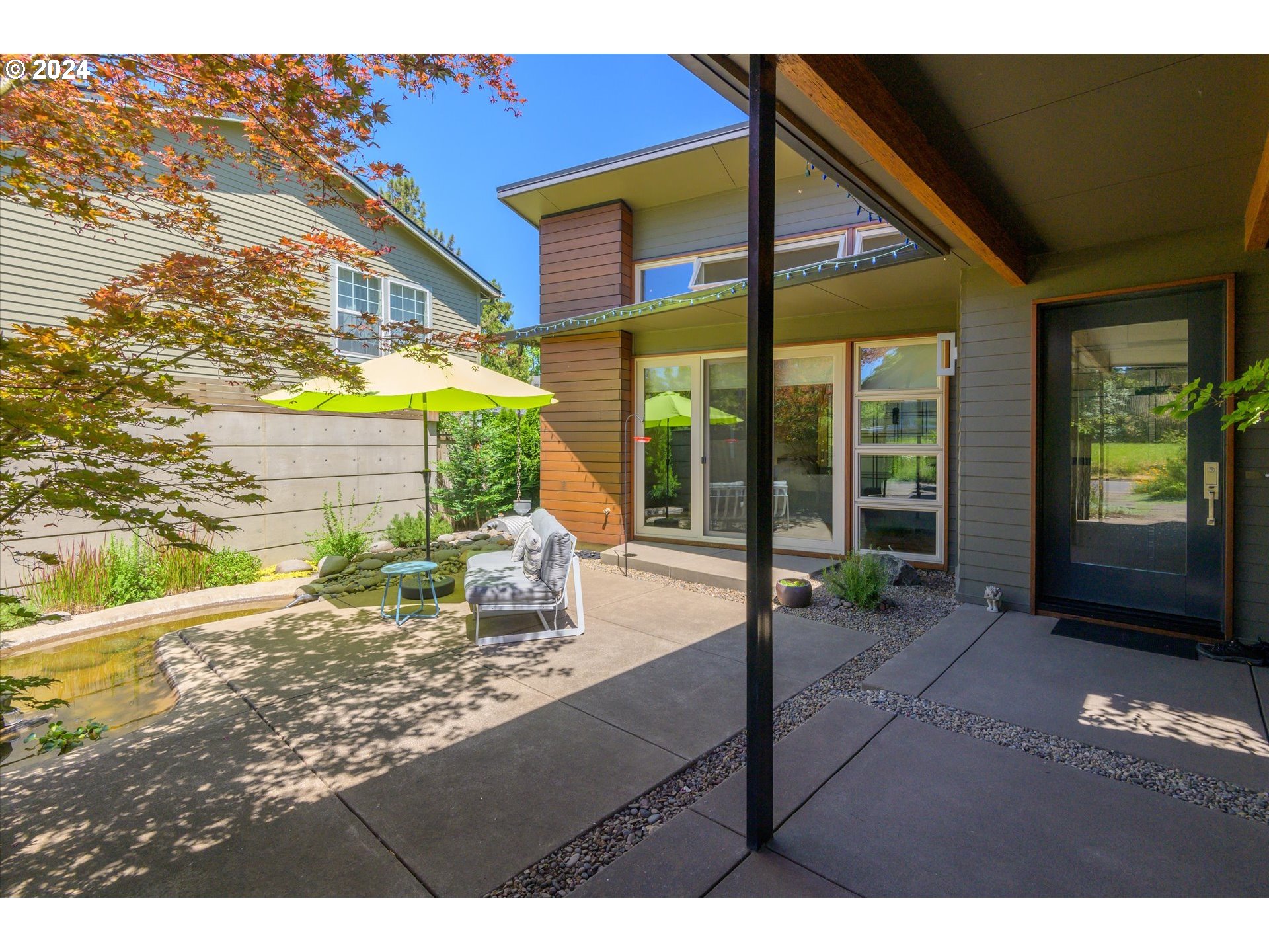 1261 Crenshaw Road Eugene, OR 97401 - Photo 40 of 48 a view of a house with a porch