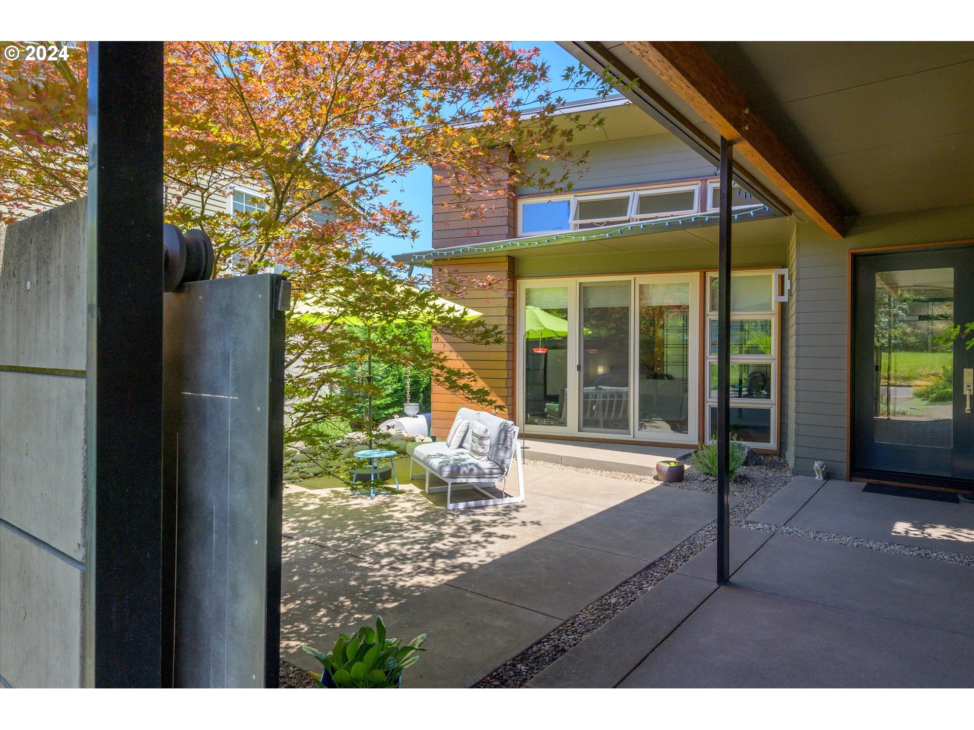 1261 Crenshaw Road Eugene, OR 97401 - Photo 6 of 48 a living room with a large window and table