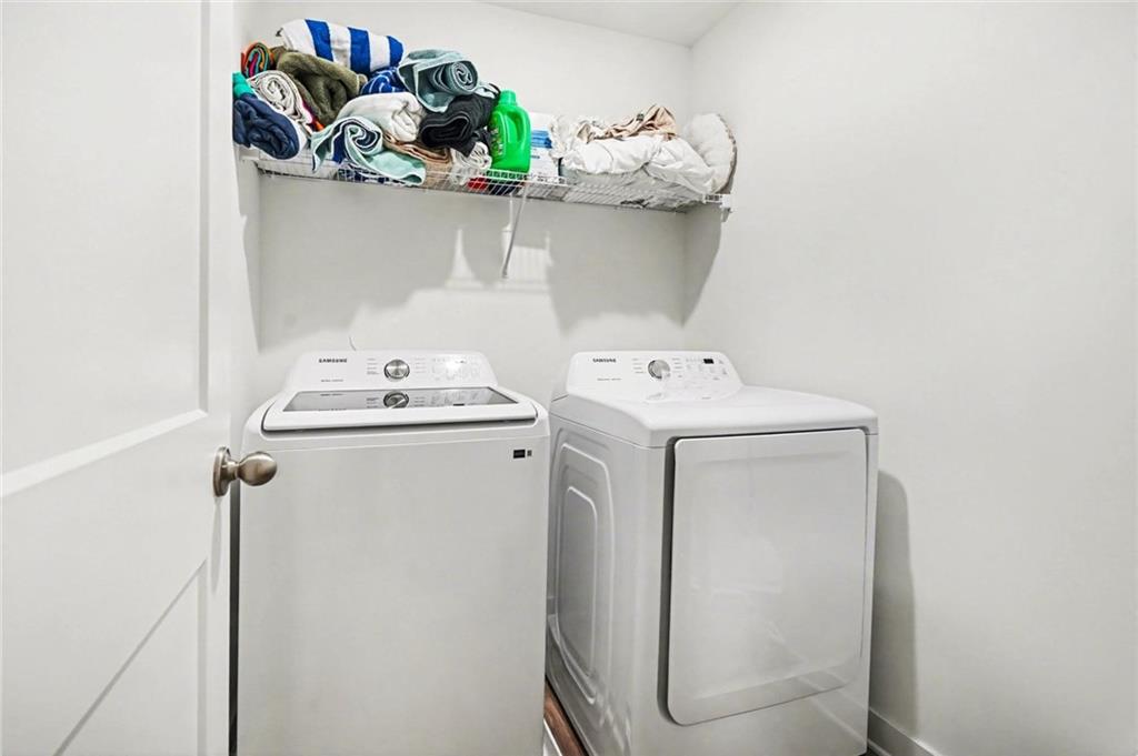 31 Breckens Way Statham, GA 30666 - Photo 13 of 24 a utility room with dryer and washer