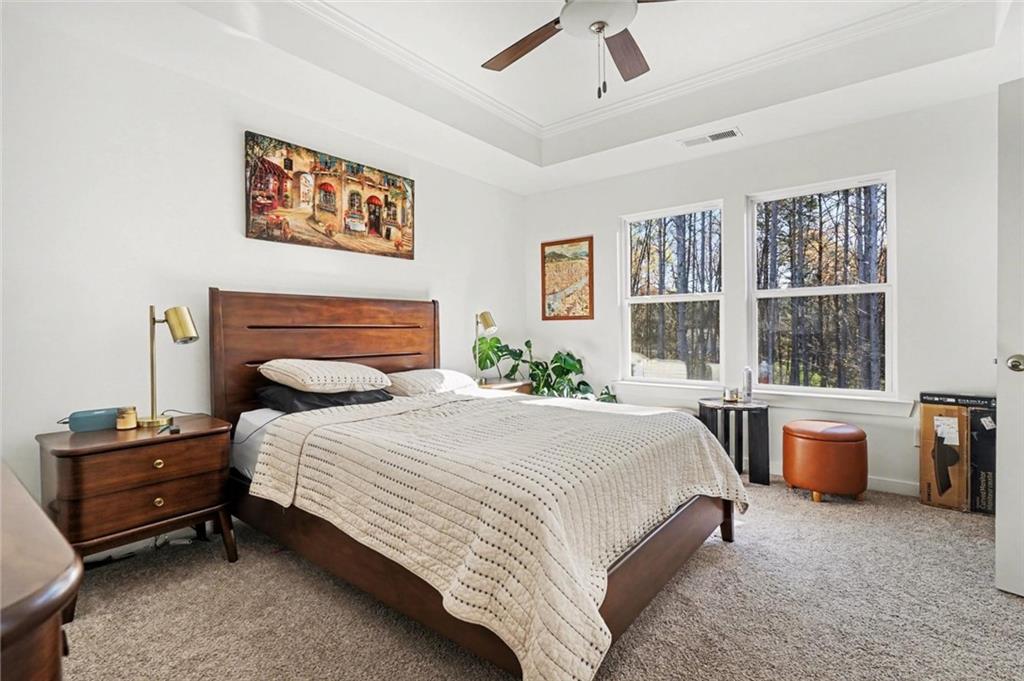 31 Breckens Way Statham, GA 30666 - Photo 16 of 24 a bedroom with a bed dresser and a window