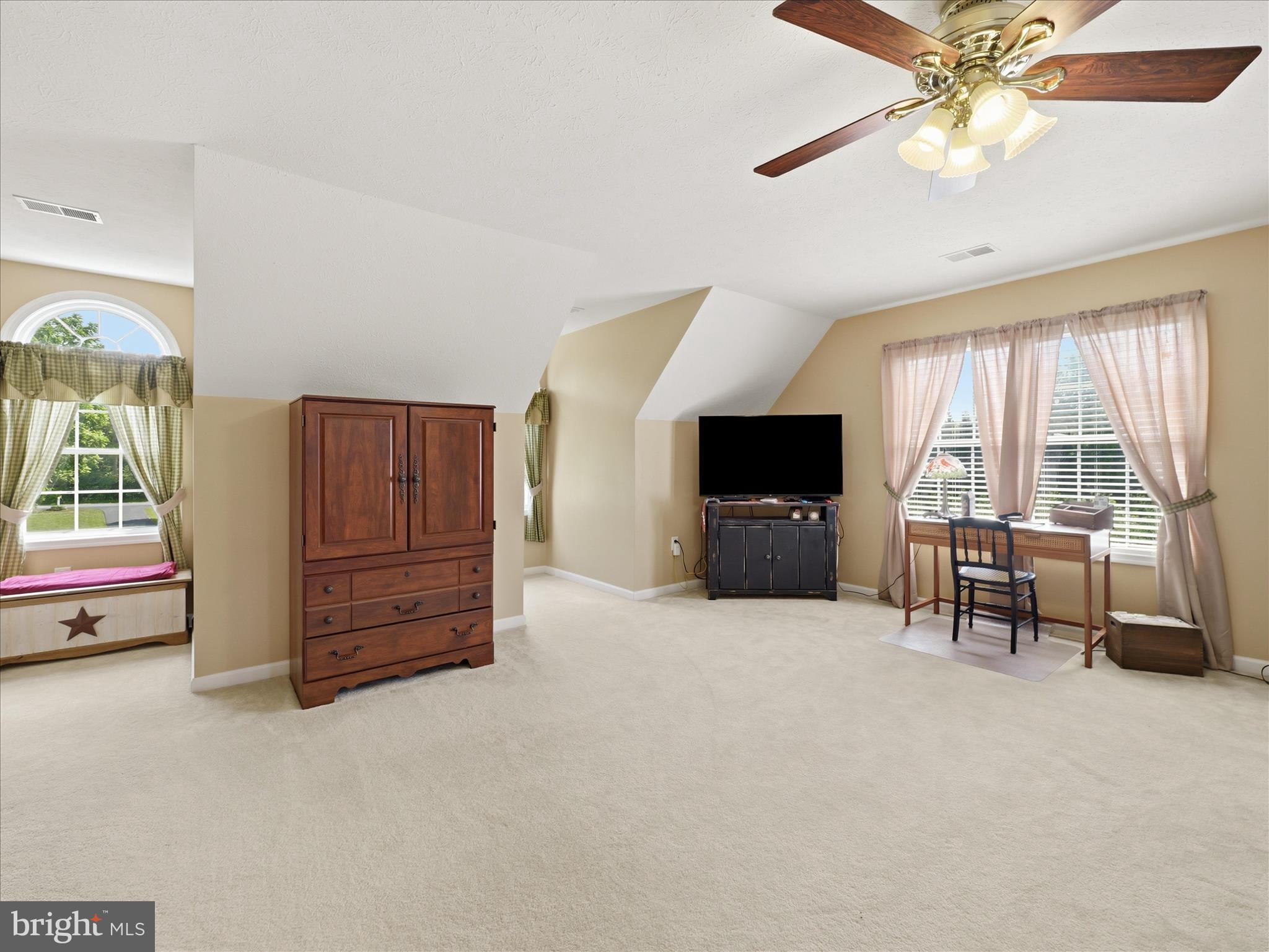 726 Doe Run Road Inwood, WV 25428 - Photo 46 of 68 a living room with furniture and a flat screen tv