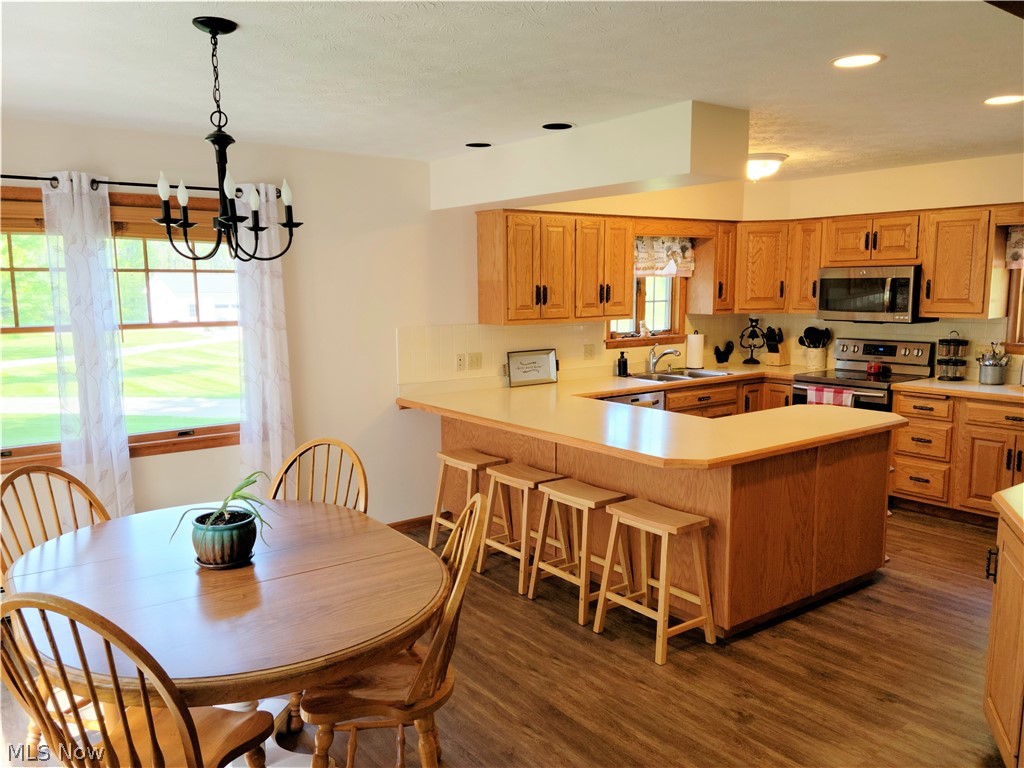3589 Lester Road Medina, OH 44256 - Photo 8 of 35 Kitchen with newer appliances is open to the dining area. LOTS OF STORAGE!