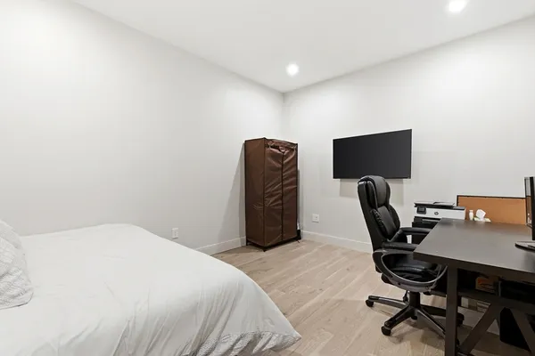 a view of a hallway with washer and dryer