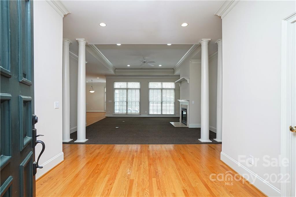 2586 Lower Assembly Drive Fort Mill, SC 29708 - Photo 12 of 48 a view of an empty room with wooden floor and a window
