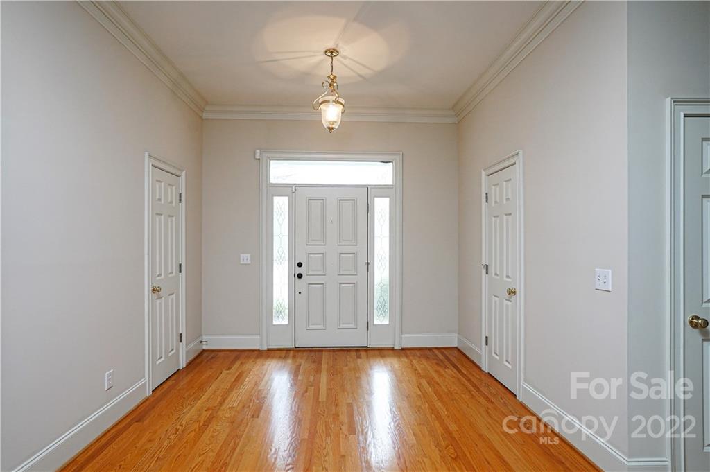 2586 Lower Assembly Drive Fort Mill, SC 29708 - Photo 13 of 48 wooden floor in an empty room with a window
