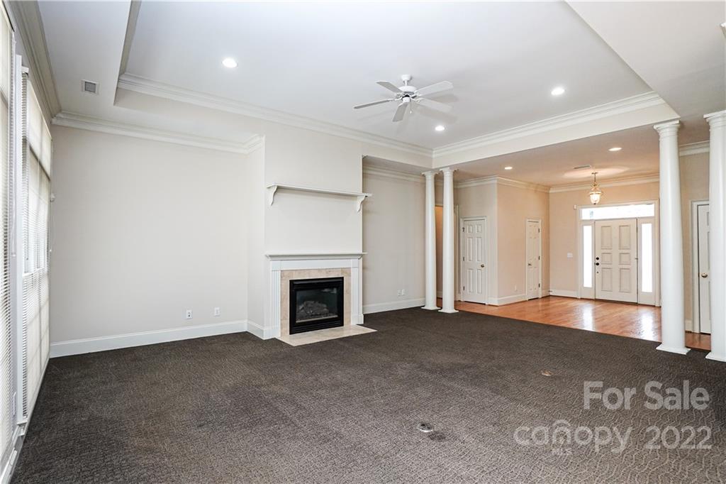 2586 Lower Assembly Drive Fort Mill, SC 29708 - Photo 15 of 48 a view of empty room with a fireplace