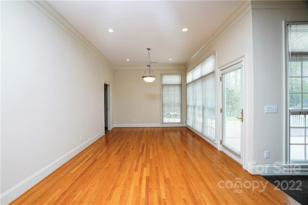 2586 Lower Assembly Drive Fort Mill, SC 29708 - Photo 23 of 48 a view of an empty room with wooden floor and a window