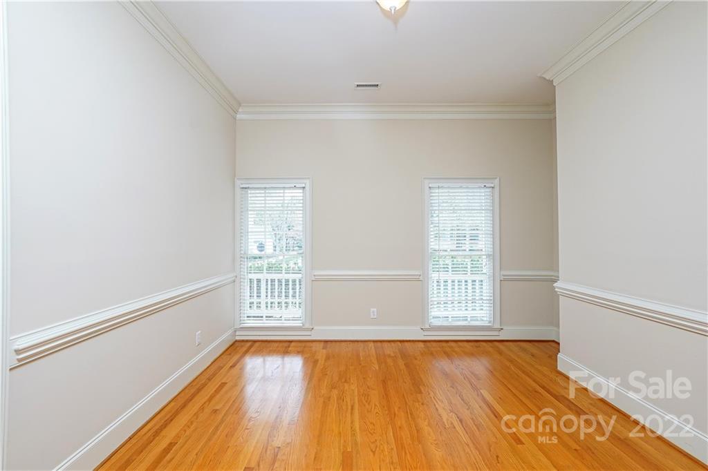 2586 Lower Assembly Drive Fort Mill, SC 29708 - Photo 24 of 48 a view of an empty room with wooden floor and a window