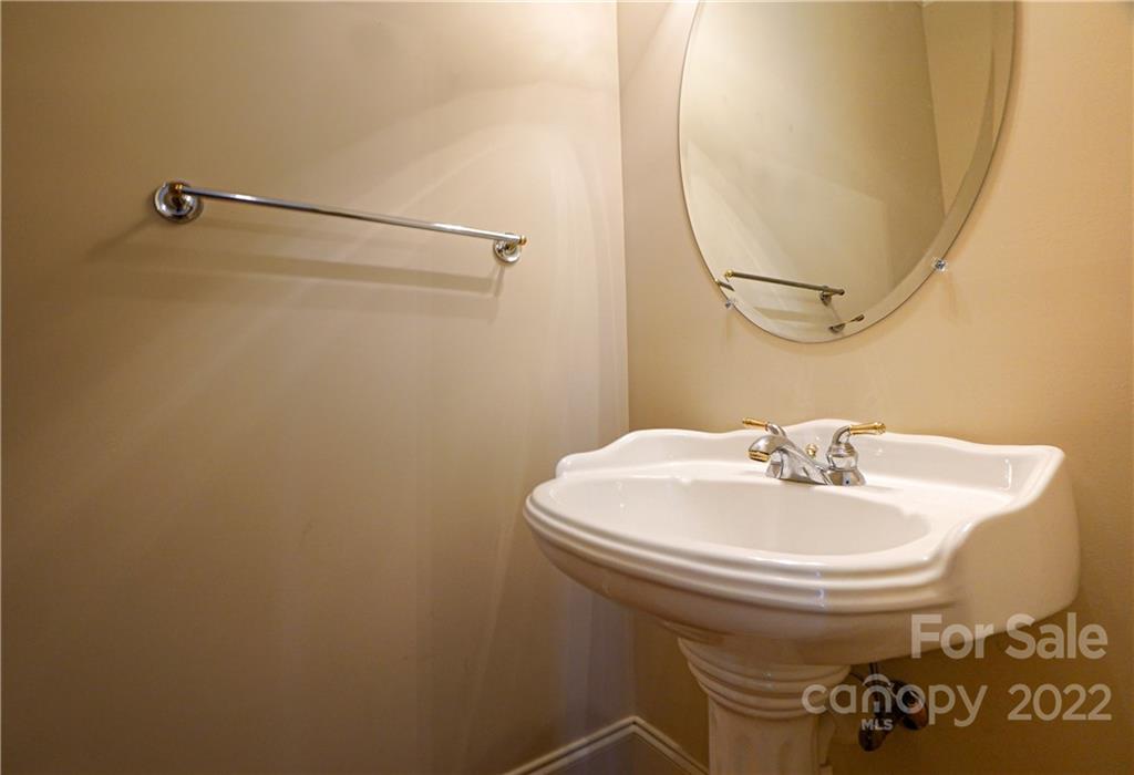 2586 Lower Assembly Drive Fort Mill, SC 29708 - Photo 43 of 48 a bathroom with a sink and mirror