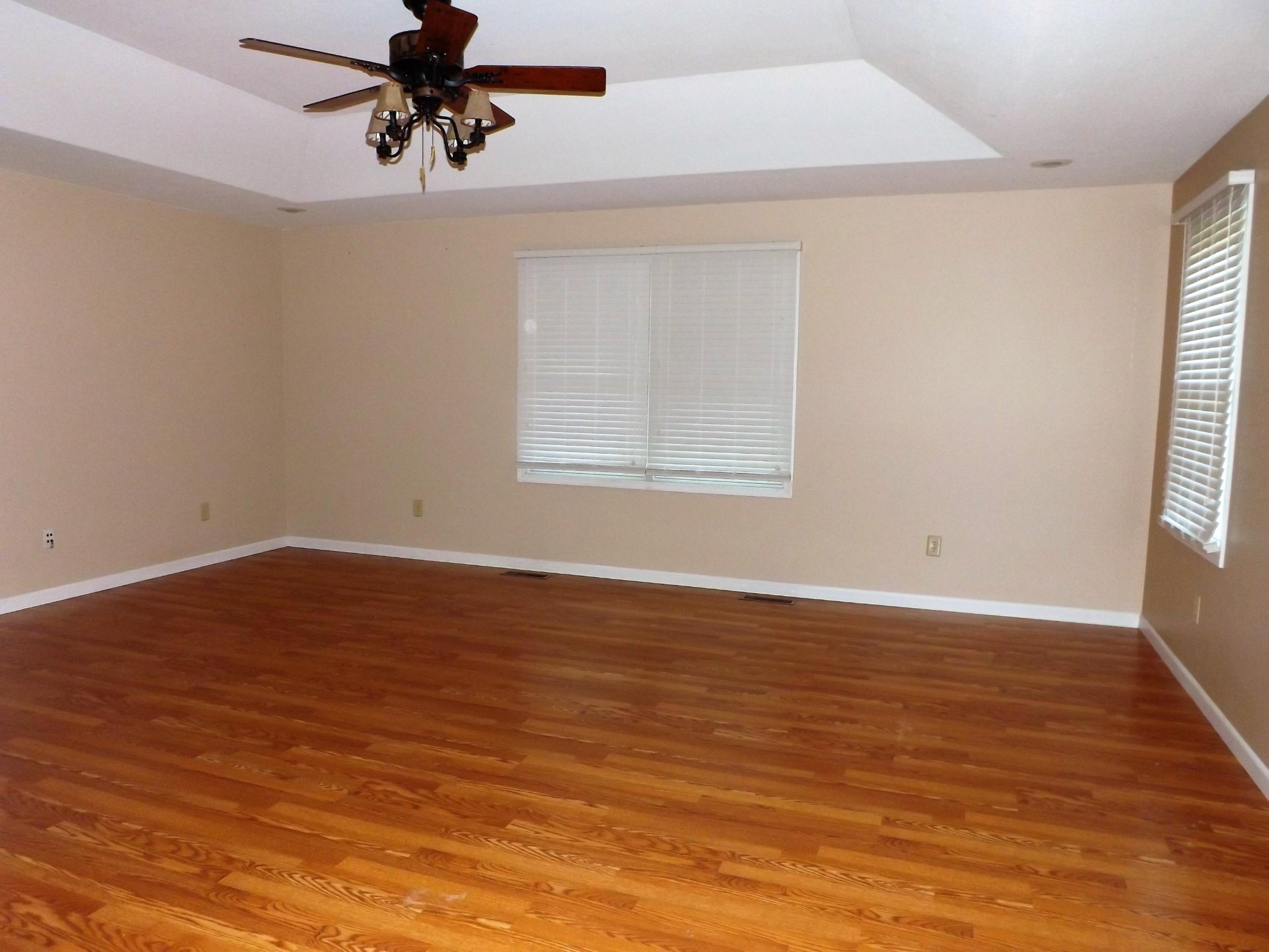 539 West Creston Road Crossville, TN 38571 - Photo 4 of 17 wooden floor in an empty room with a window