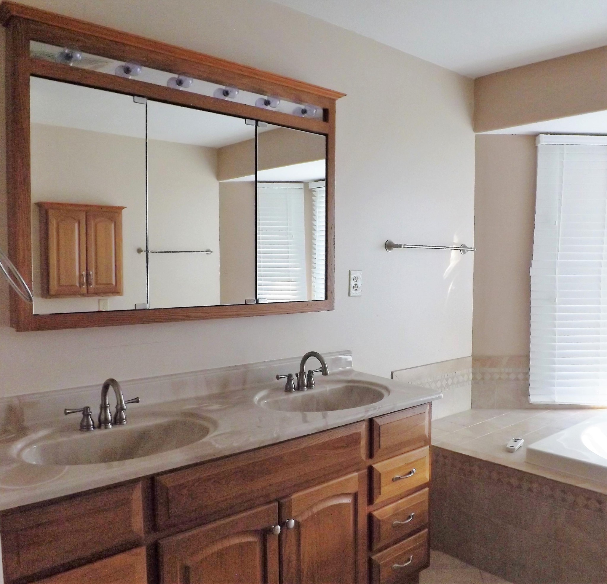 539 West Creston Road Crossville, TN 38571 - Photo 8 of 17 a bathroom with a granite countertop sink and a mirror