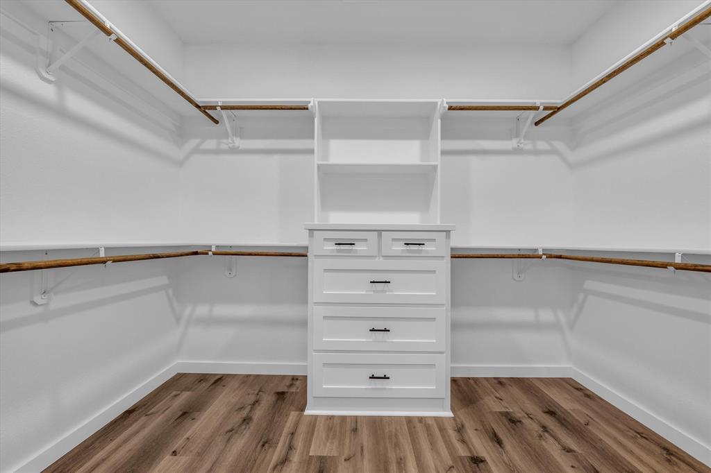 308 Crye Circle Robinson, TX 76706 - Photo 22 of 37 a view of walk in closet with empty racks