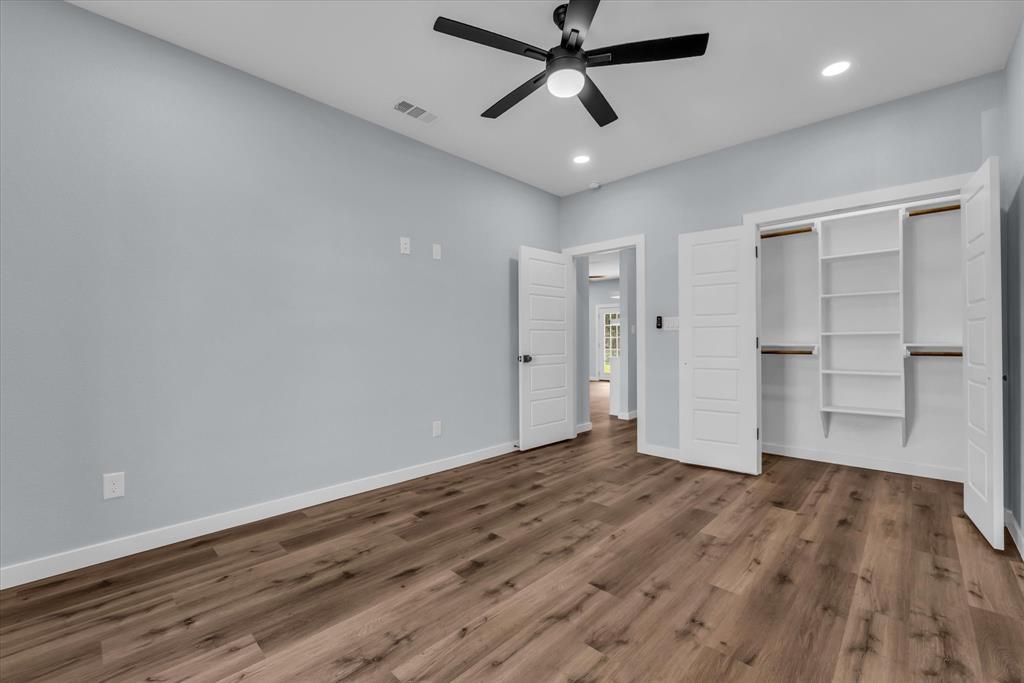308 Crye Circle Robinson, TX 76706 - Photo 28 of 37 an empty room with closet and a ceiling fan