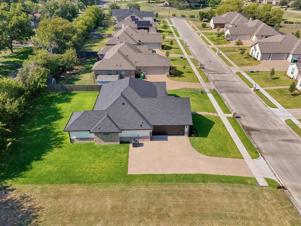 308 Crye Circle Robinson, TX 76706 - Photo 34 of 37 an aerial view of residential houses with yard and swimming pool