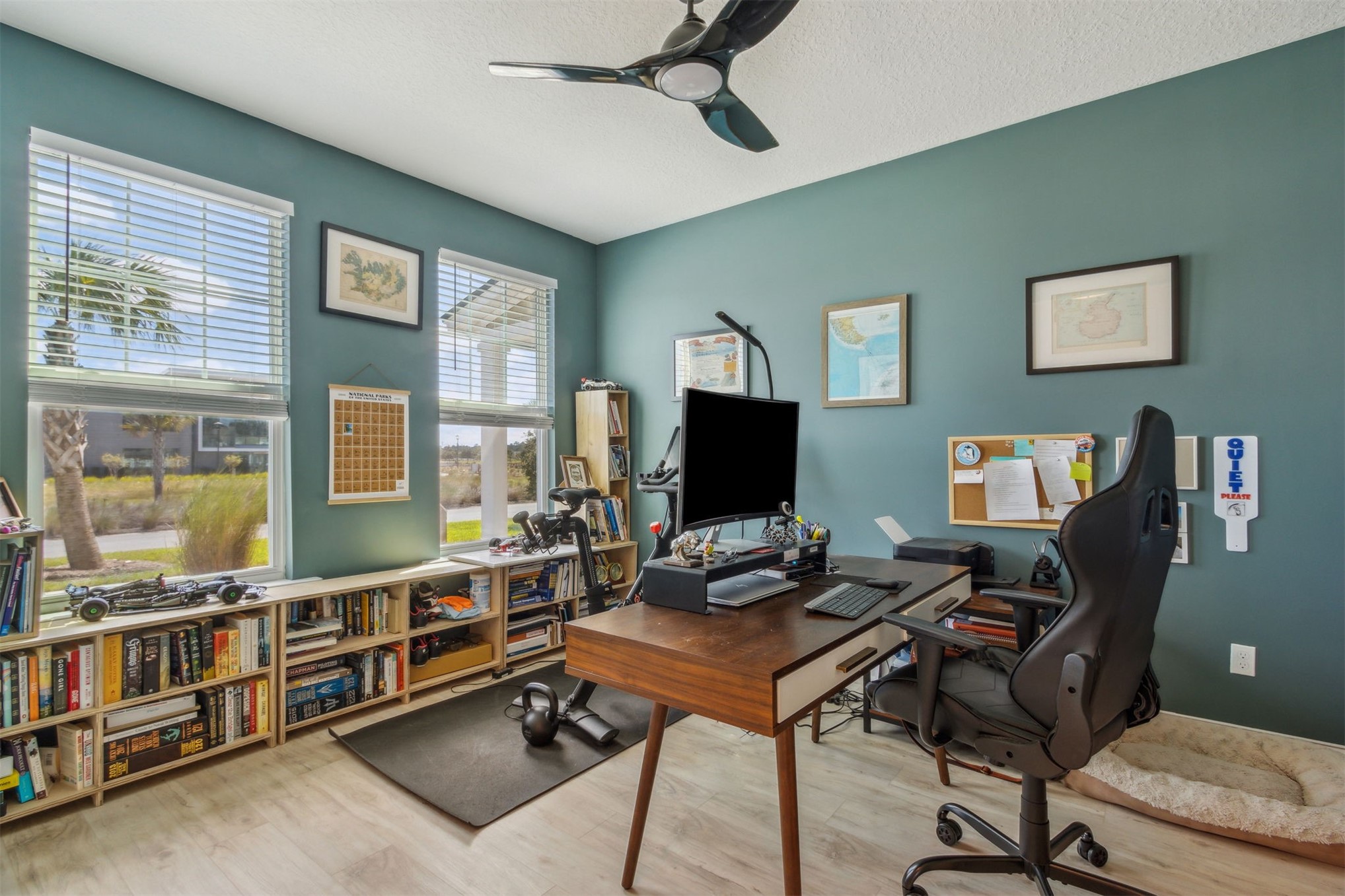 213 Daydream Avenue Yulee, FL 32097 - Photo 14 of 40 a view of a livingroom with workspace and a window