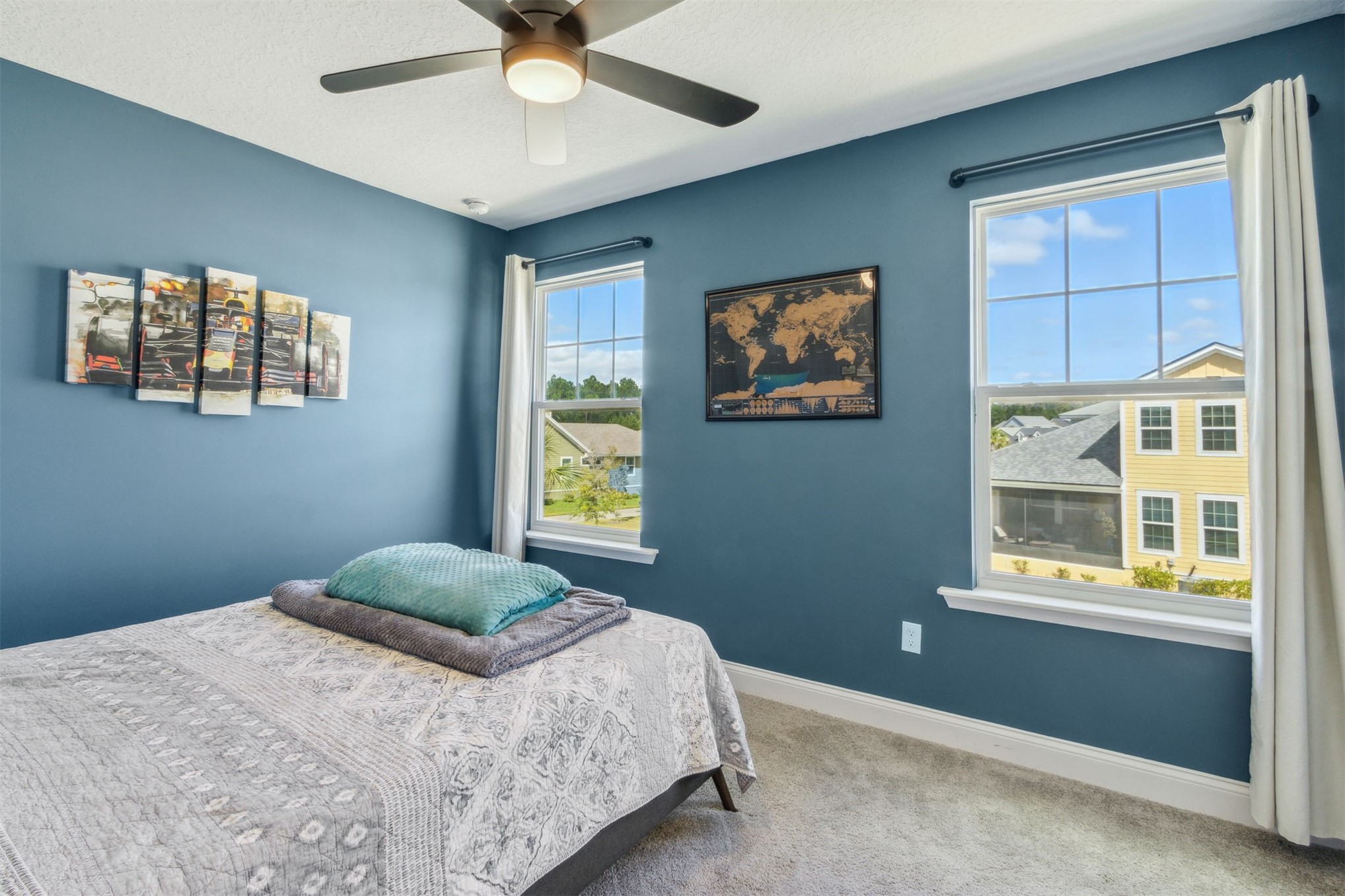 213 Daydream Avenue Yulee, FL 32097 - Photo 24 of 40 a bedroom with a bed and a window
