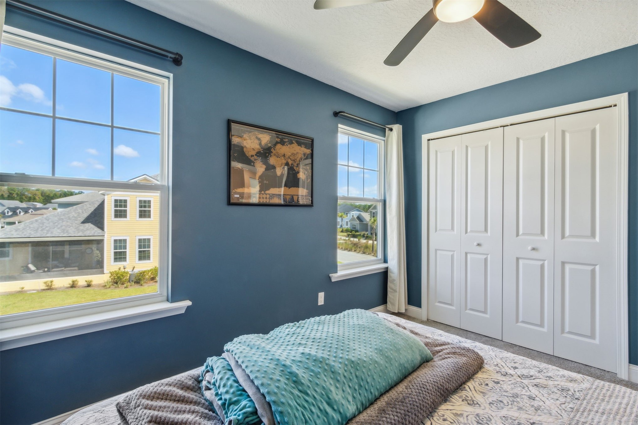 213 Daydream Avenue Yulee, FL 32097 - Photo 26 of 40 a bedroom with a bed and a window