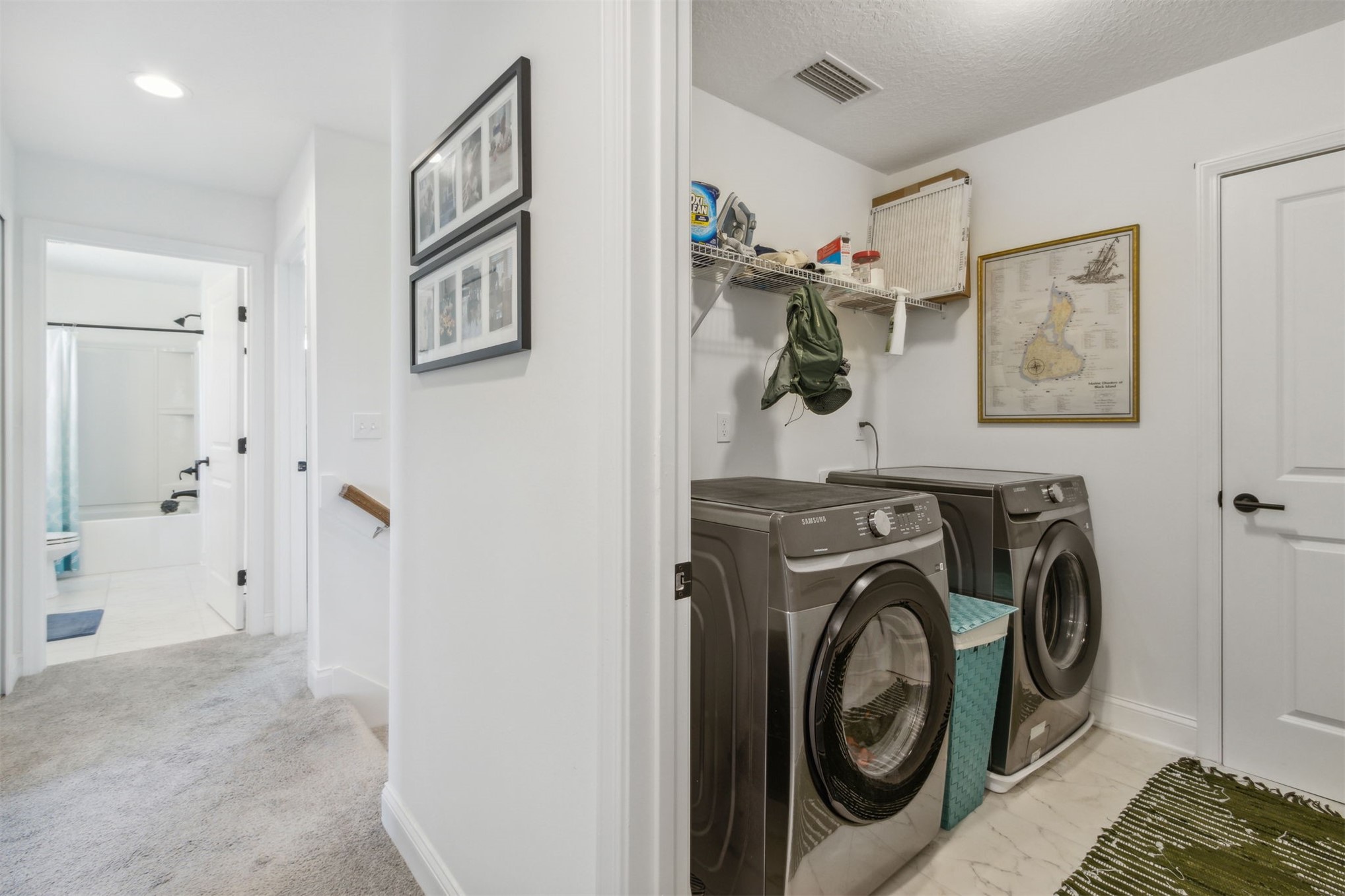 213 Daydream Avenue Yulee, FL 32097 - Photo 27 of 40 a view of a storage & utility room with washer and dryer