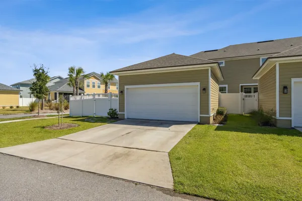 a view of a swimming pool with lawn chairs