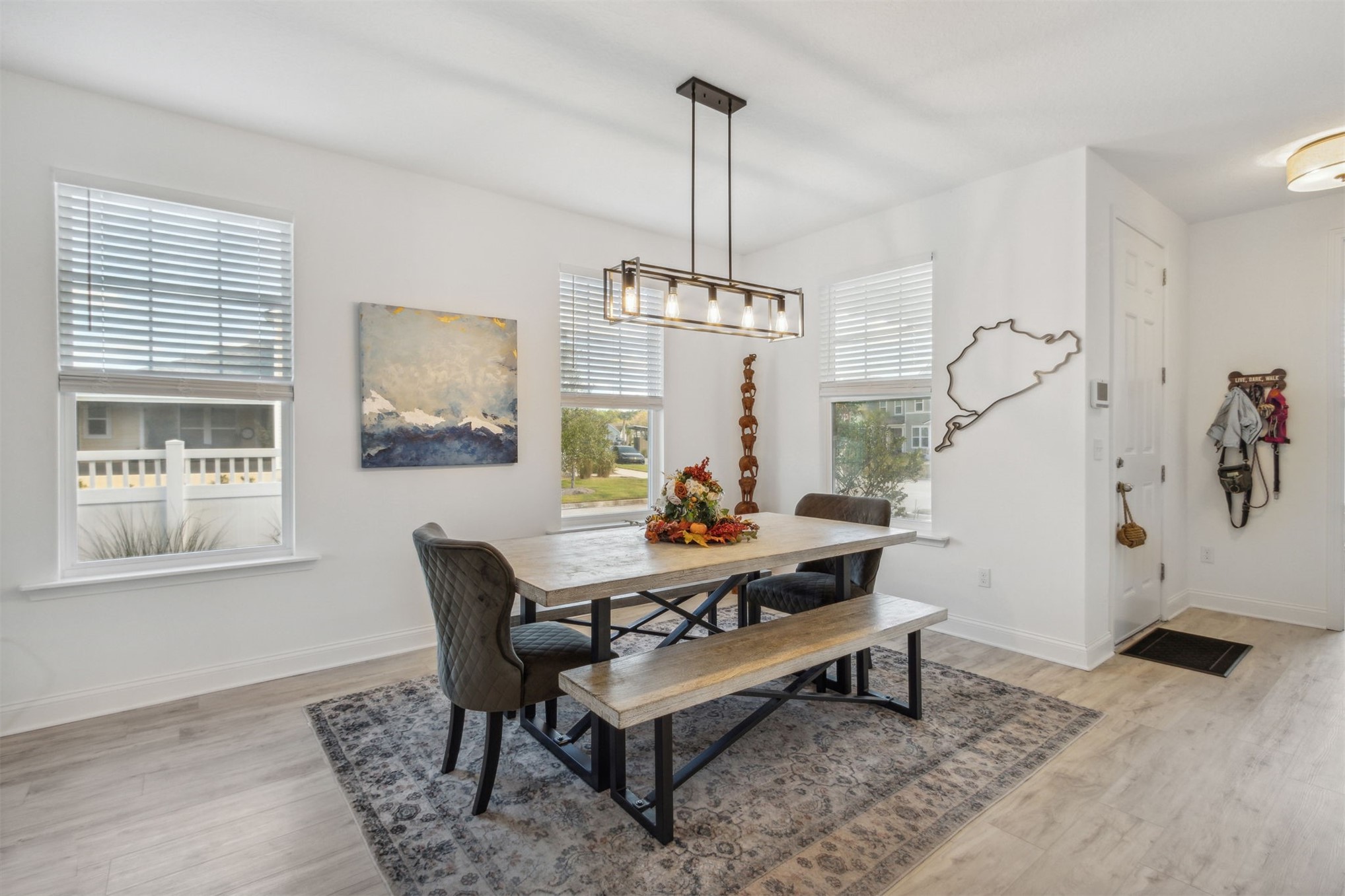 213 Daydream Avenue Yulee, FL 32097 - Photo 6 of 40 a living room with furniture and a window