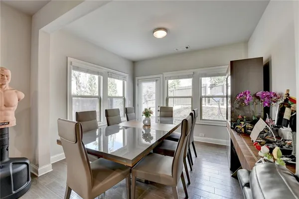 a view of a dining room with furniture window and outside view