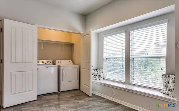 a view of utility room and washer and dryer