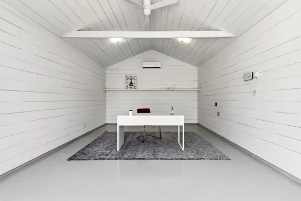 a living room with a rug
