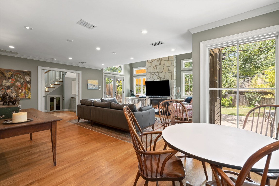 2208 Mountain View Road Austin, TX 78703 - Photo 14 of 39 a living room with furniture a flat screen tv and a large window