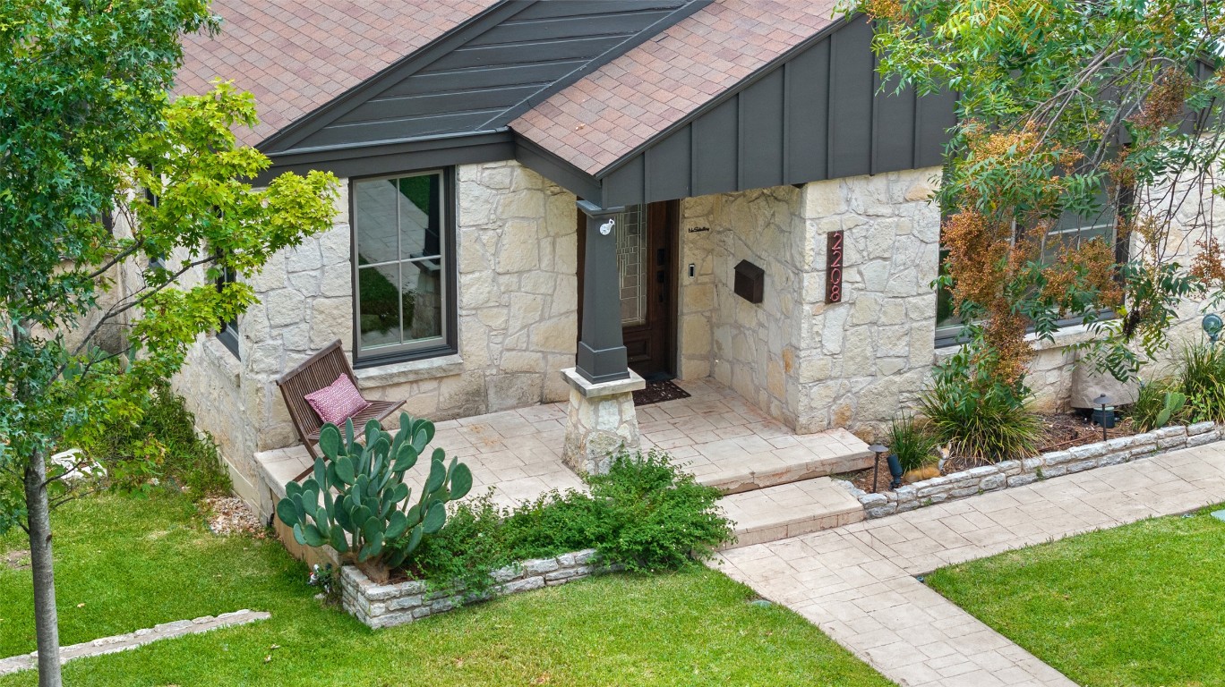 2208 Mountain View Road Austin, TX 78703 - Photo 2 of 39 a front view of a house with garden