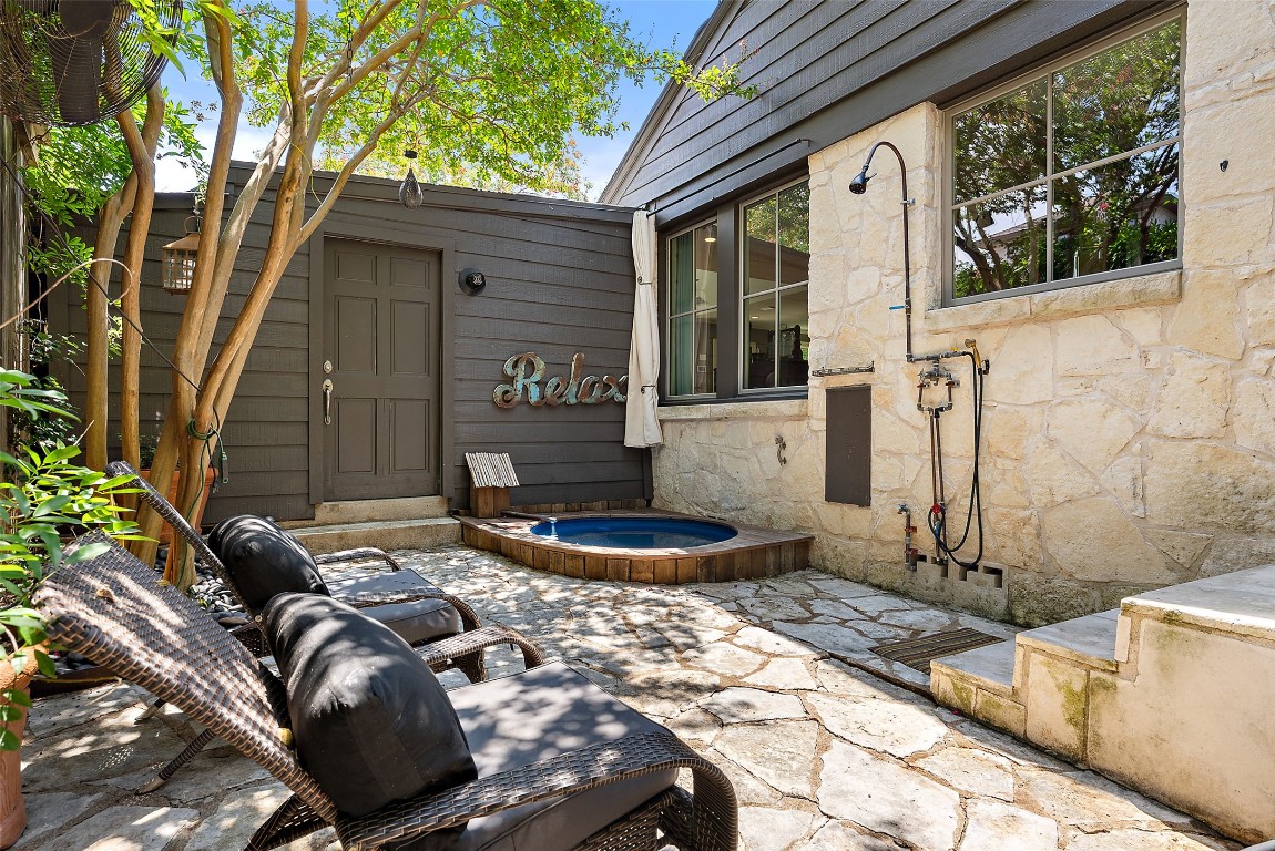 2208 Mountain View Road Austin, TX 78703 - Photo 36 of 39 a backyard of house with chairs