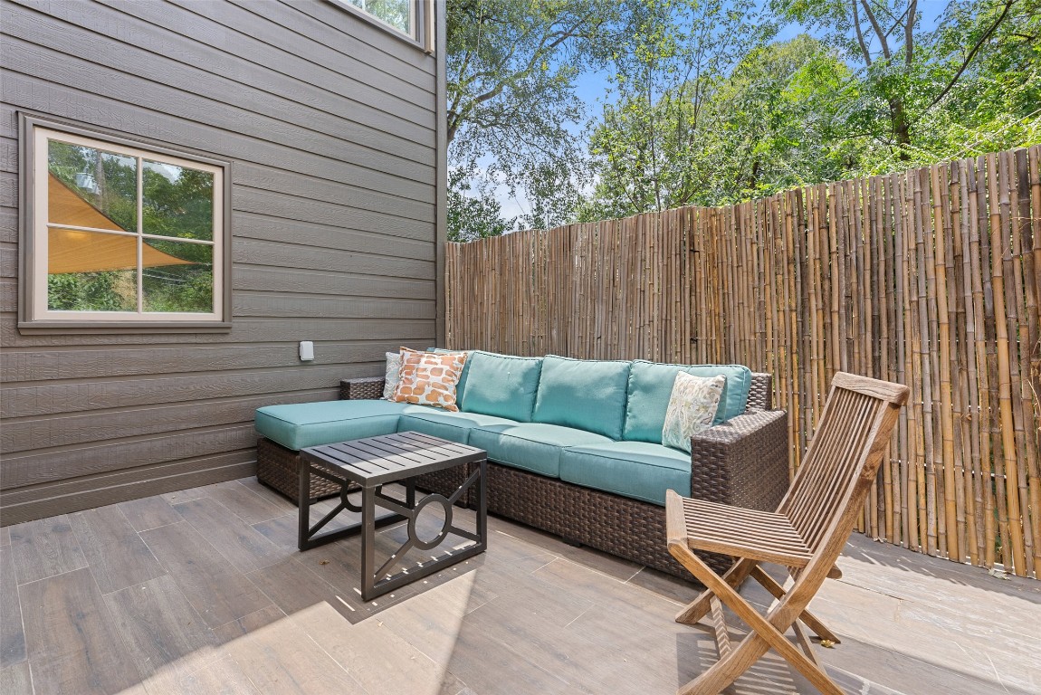 2208 Mountain View Road Austin, TX 78703 - Photo 37 of 39 a outdoor living space with furniture and a window