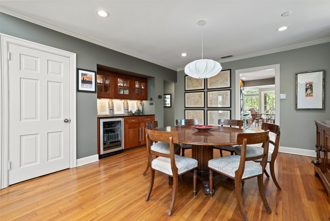 2208 Mountain View Road Austin, TX 78703 - Photo 10 of 39 a view of a dining room with furniture window and wooden floor