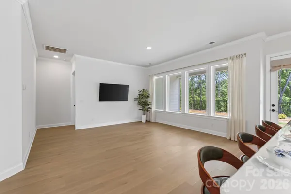a view of livingroom with furniture window and wooden floor
