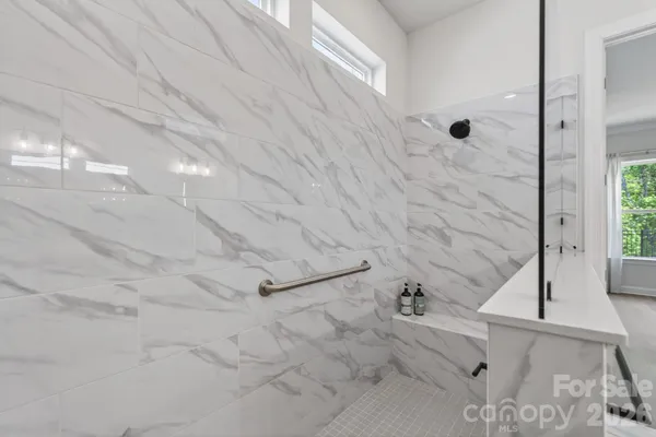 a bathroom with a bathtub