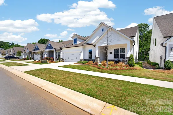 a view of a house with a swimming pool