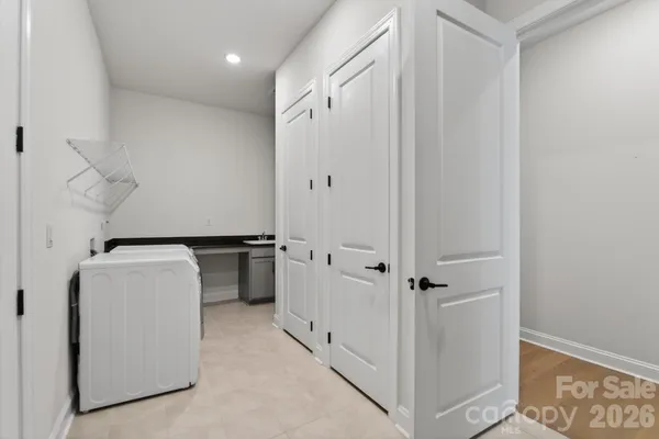 a view of a hallway with closet