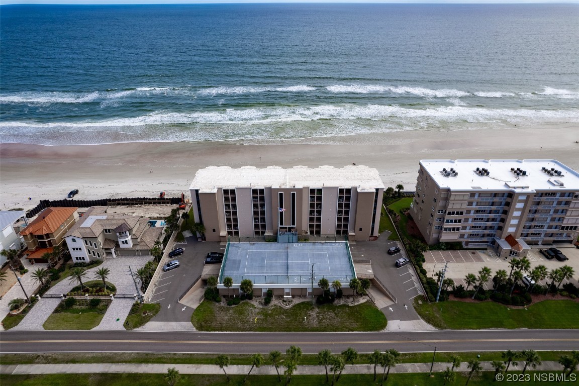 4745 South Atlantic Avenue, Unit 4030 Ponce Inlet, FL 32127 - Photo 24 of 47 a view of a swimming pool with outdoor seating